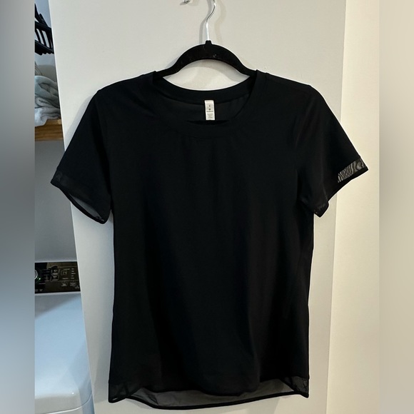 lululemon athletica Tops - Lululemon “Serve up some sun short sleeve”. Size 6.